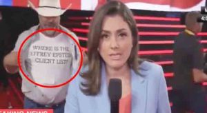 Live CNN Report Interrupted by Man Wearing 'Where's Jeffrey Epstein Client List' Shirt